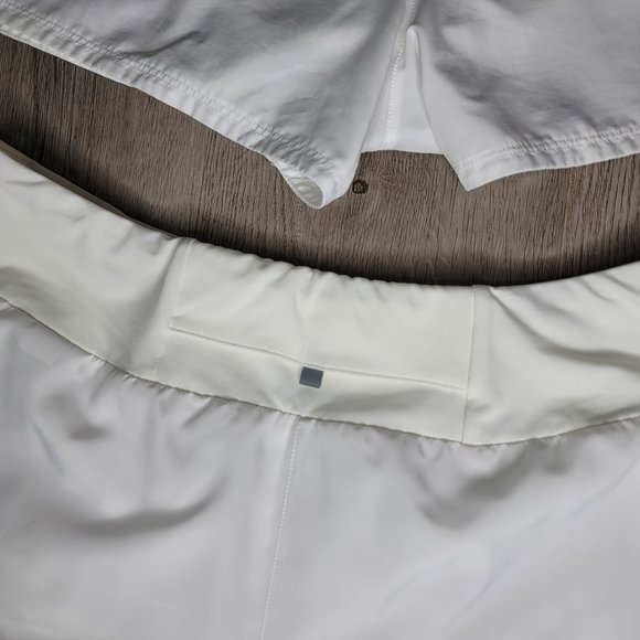 Nike dri fit white running shorts set of 4. pocket on back with lining size Larg - Picture 4 of 13